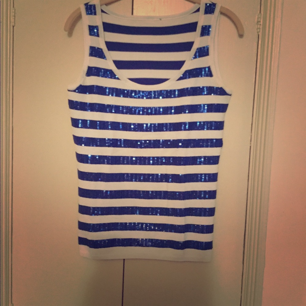 Diane Gilman sequined tank tops.